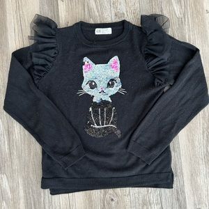 Girls H&M cat sequin shirt. The sequins turn black to silver as in picture.